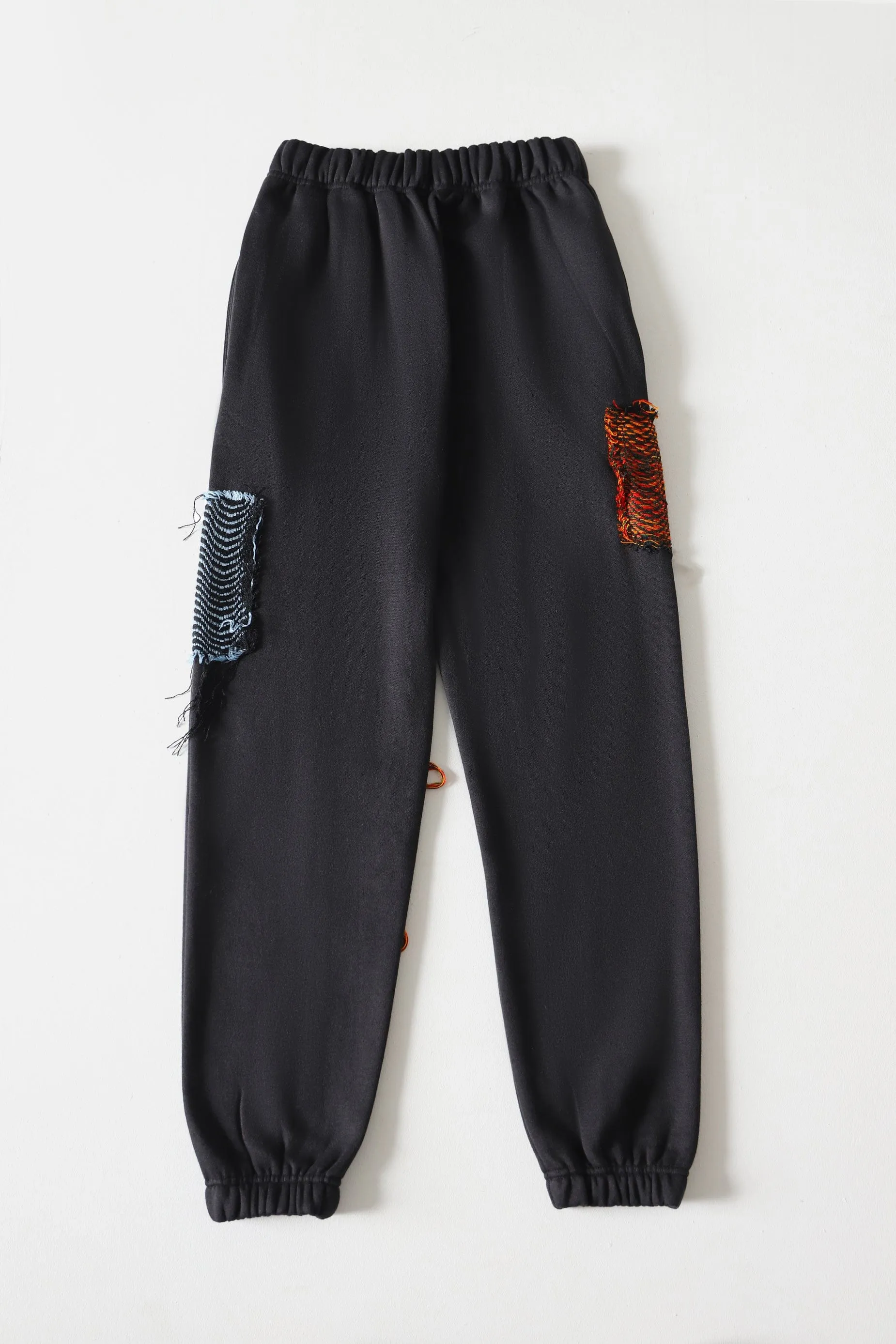 HANDWOVEN PATCH SWEATPANTS